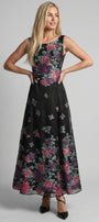 Rina cyclamen floral A-line maxi dress shown from the front with sleeveless bodice and rounded neckline.