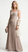 Beige lace gown styled on the model with a soft ivory wrap and matching lace clutch for evening arrival