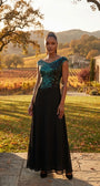 Full-length Greta gown photographed at golden hour in a vineyard setting