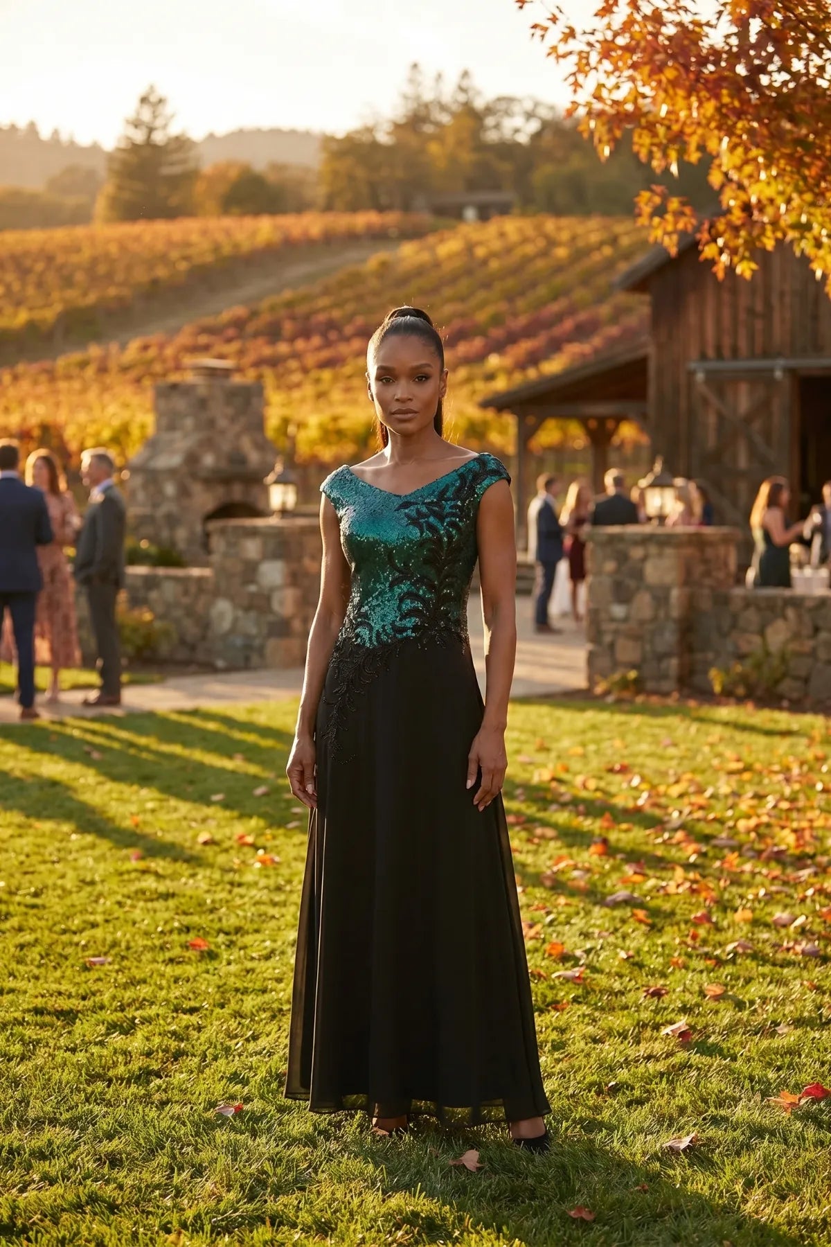 Greta teal and black evening gown shown full length at a fall vineyard celebration