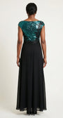 Back view showing the sequined bodice, center back zipper, and flowing black chiffon skirt