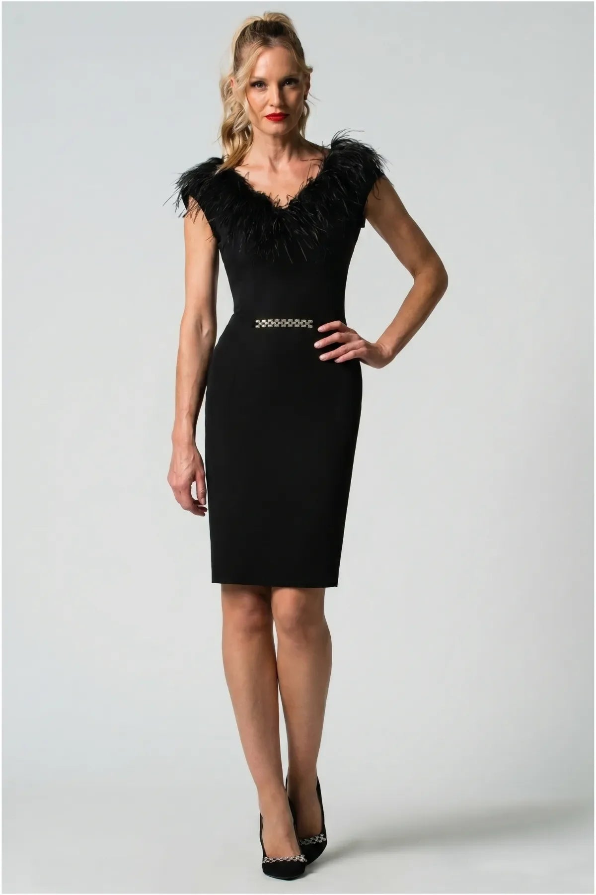 Black Feather Trim Dress, Dora. Styled without the feather collar, with a black clutch and a white rose, showing the V-neck and crystal waist.