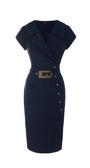 Navy wrap dress with structured lapel, asymmetrical metallic buttons, wide belt with statement buckle, tailored pencil silhouette.