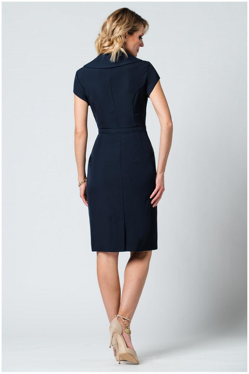Woman wearing a tailored navy wrap dress with short sleeves and pencil skirt, shown from the back