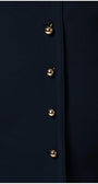 Close-up of metallic buttons on the navy wrap dress Olga by Luna Fashion House with a tailored pencil silhouette.
