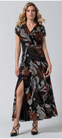 Woman wearing Long Dress Lola with deep V-neck and side slit in earthy bohemian print, posing against gray background