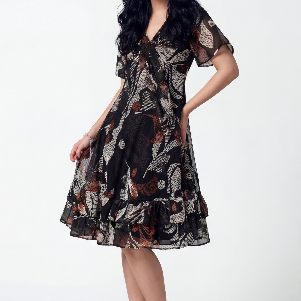 Floral Print Ruffle Dress, Lola. Front view on the model, V neckline and sheer short sleeves.