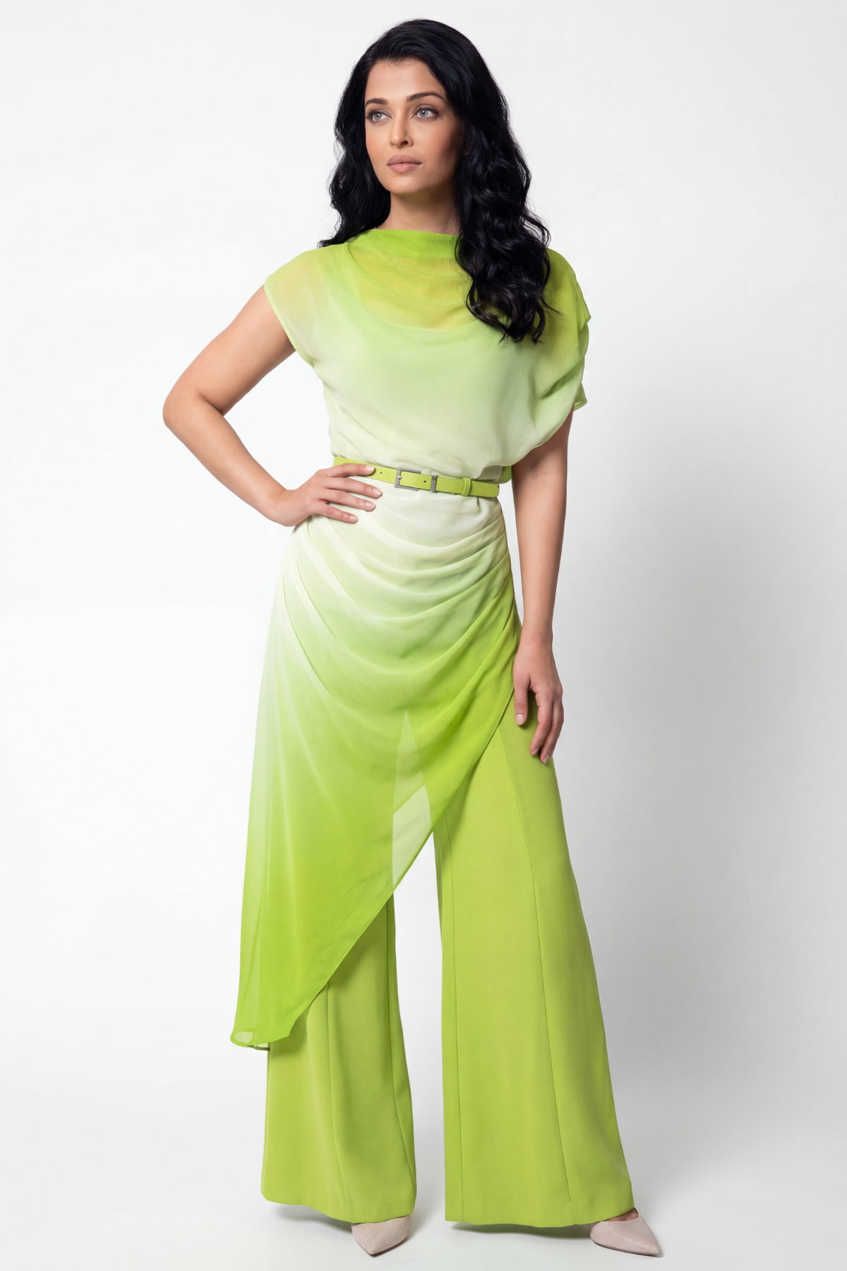 Woman wearing a green outfit with a white background