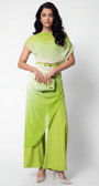 Woman wearing a green outfit with a belt on a white background