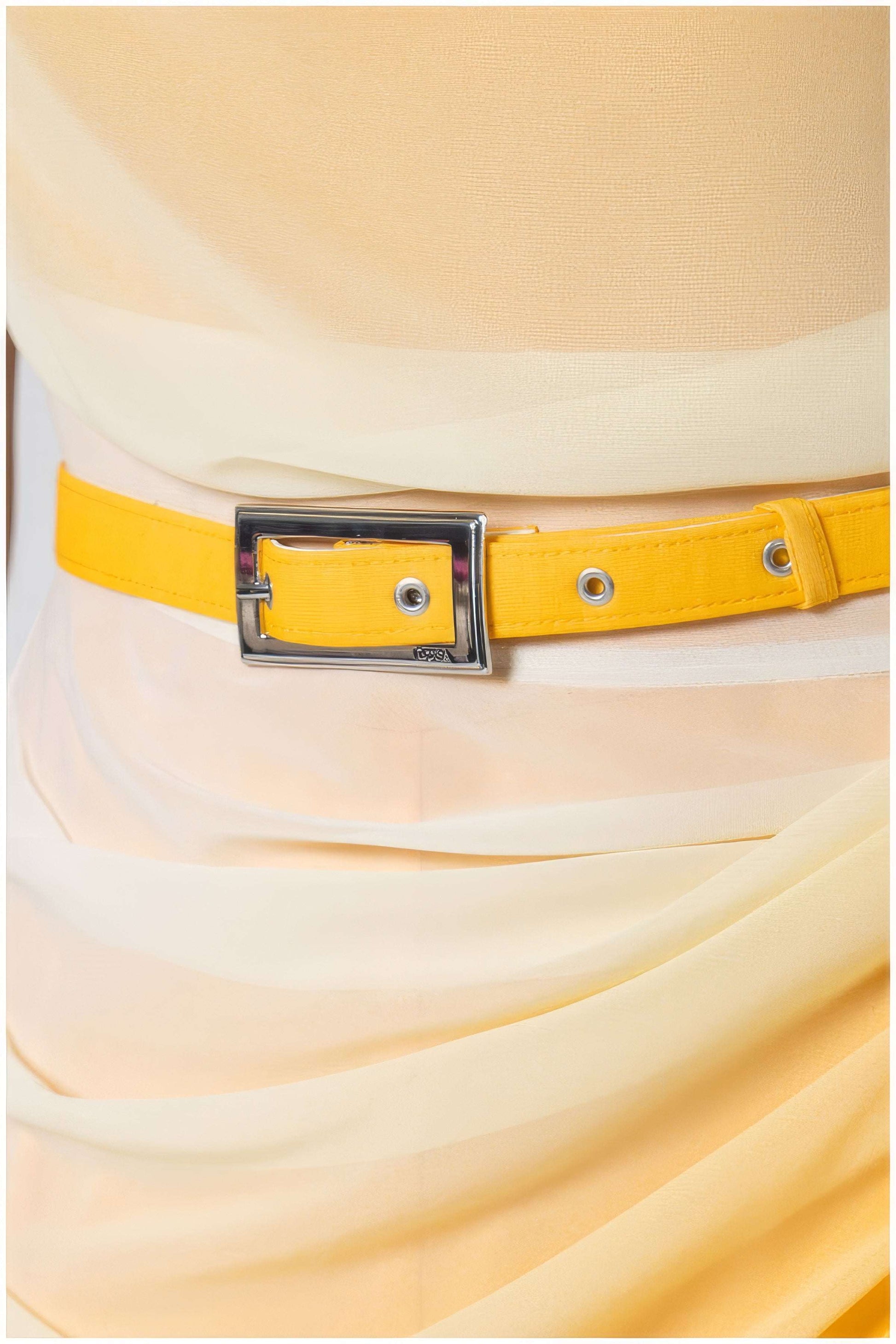 Close-up of yellow belt detail on the Tina Overalls in Yellow showcasing ombre fabric and silver buckle design