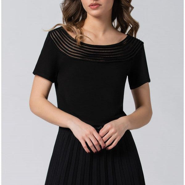Black Lola business Top with pleated neckline and short sleeves on female model