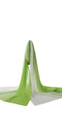Lightweight green scarf in green ombre fabric, flowing elegantly to add texture and sophistication to any outfit.