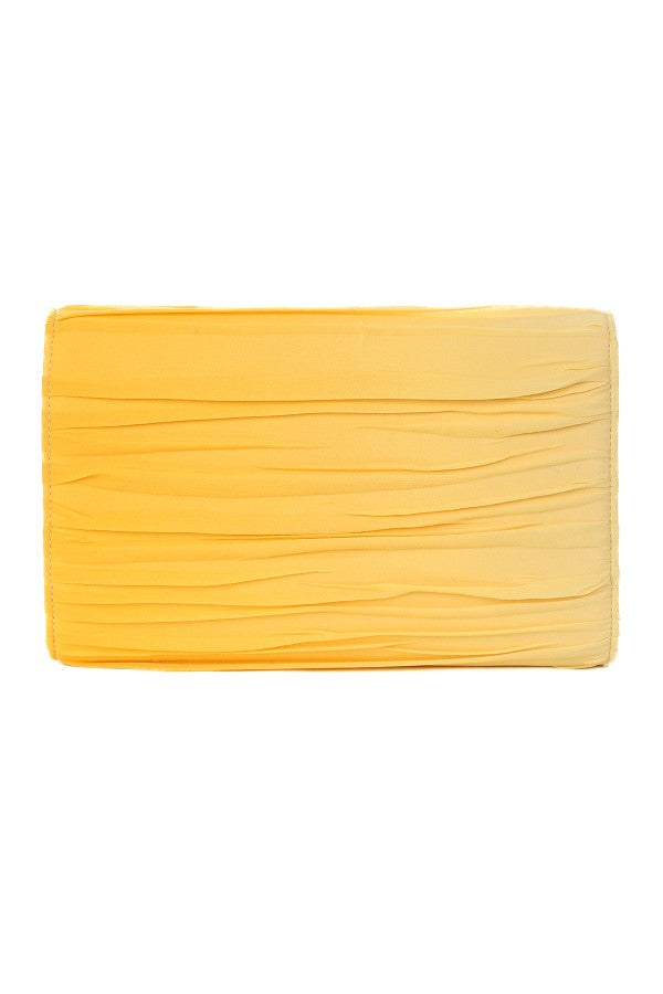 Ombre yellow evening clutch bag with textured folds and a smooth gradient from light to golden hues.