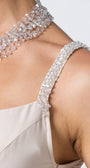 Close-up of the crystal-embellished spaghetti strap with hand-applied beading