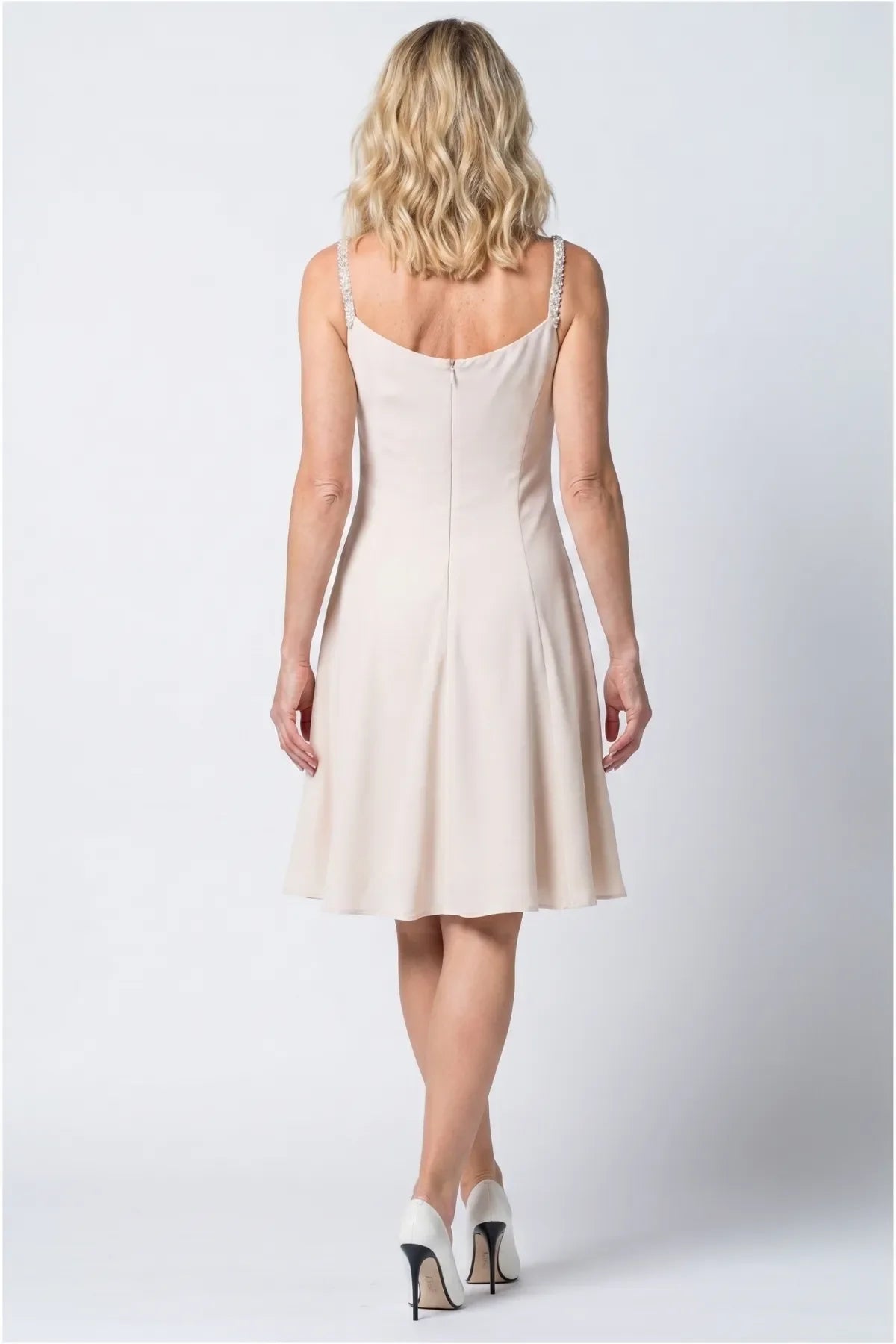Lesli Short Dress back view in beige, plain solid back with center back zipper and crystal-embellished strap detail