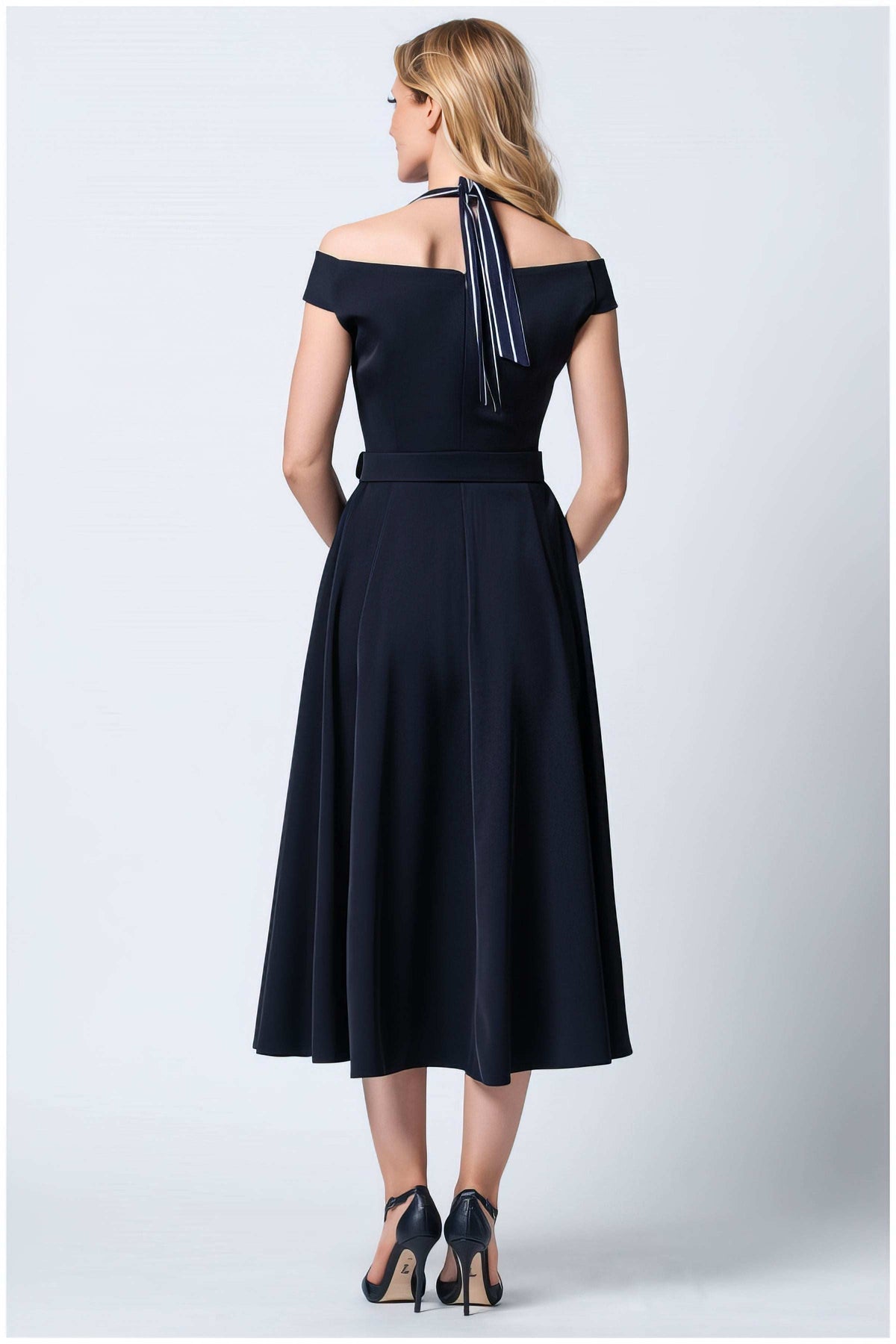 Greta Off-Shoulder Dress in Navy. Off-shoulder dress. Pleated A-line skirt.
