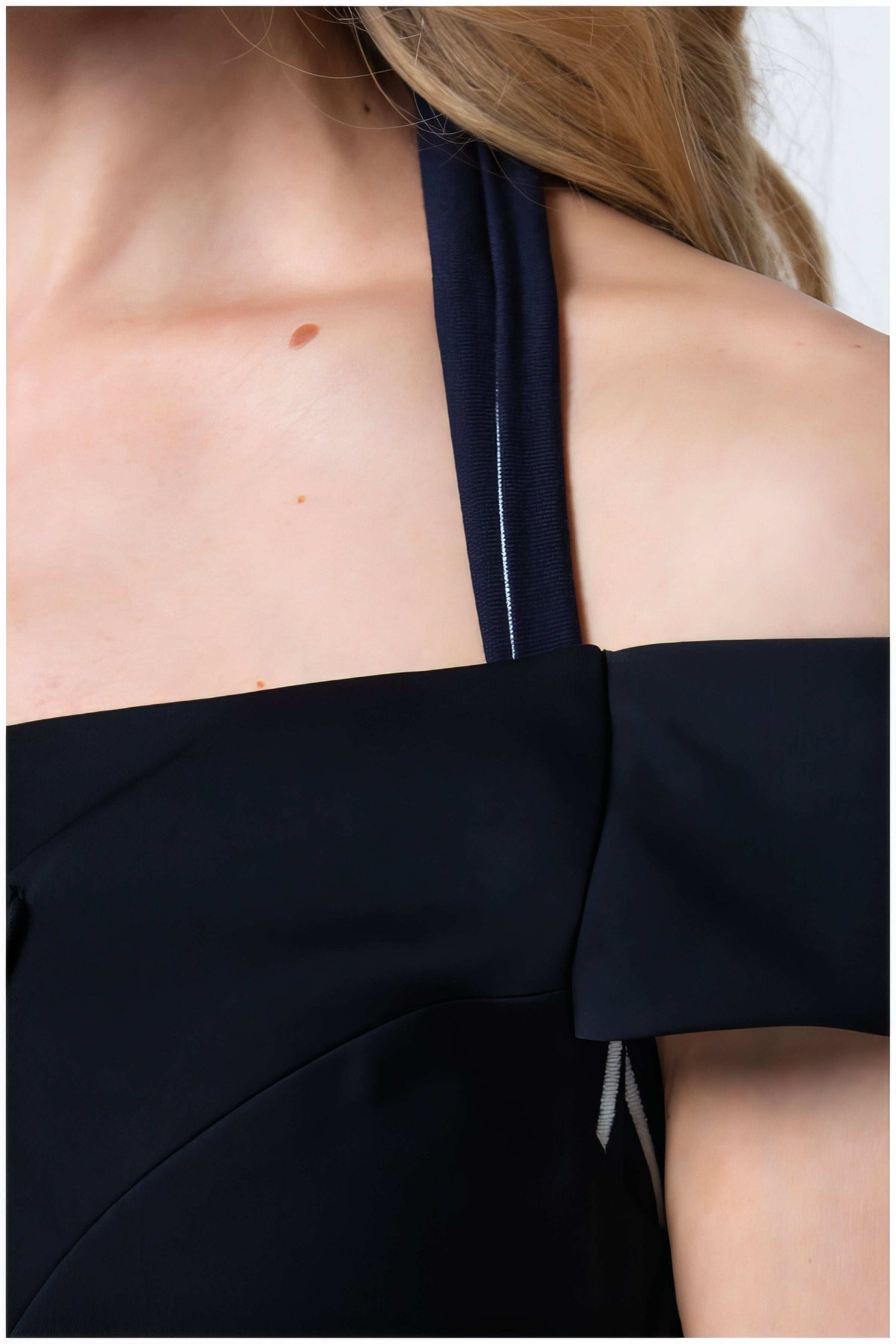 Close up of off-shoulder neckline detail on navy Greta midi dress, Luna Fashion House