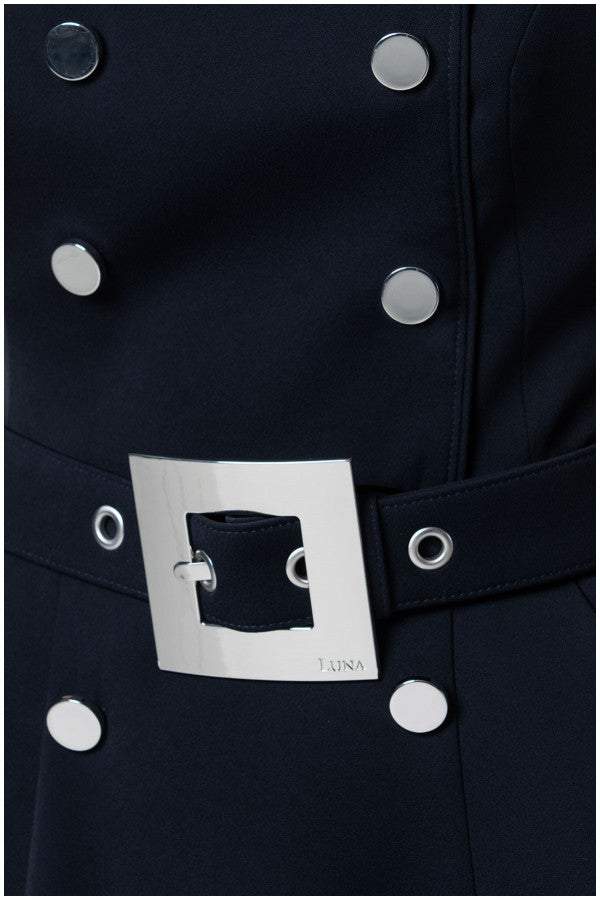 Close-up of navy belted off-shoulder elegant midi dress with silver square buckle and button details on fabric