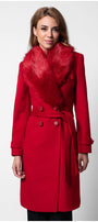 Woman wearing a red coat with fur collar on a white background Luna Fashion House design