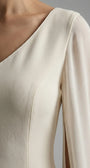 Rebeka ivory short dress shown flat with V neckline, waist charm and knee-length sheath line