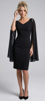 Front view of the Rebeka black fitted short dress with V neckline and flowing sheer cape sleeves