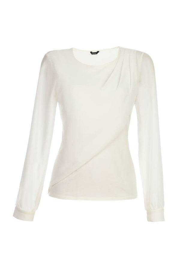 Flat lay of white viscose blouse showing draped shoulder