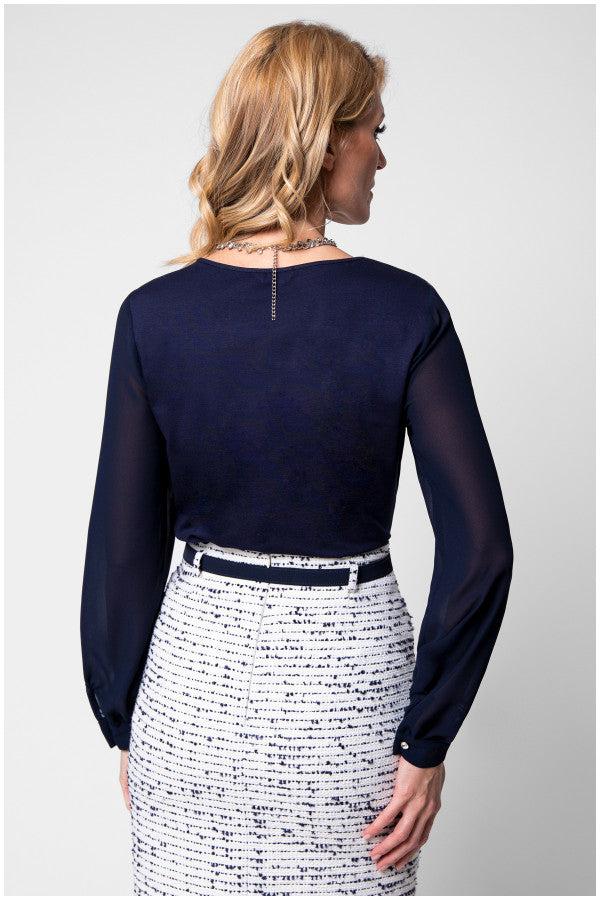 Back view of navy viscose blouse with zipper detail