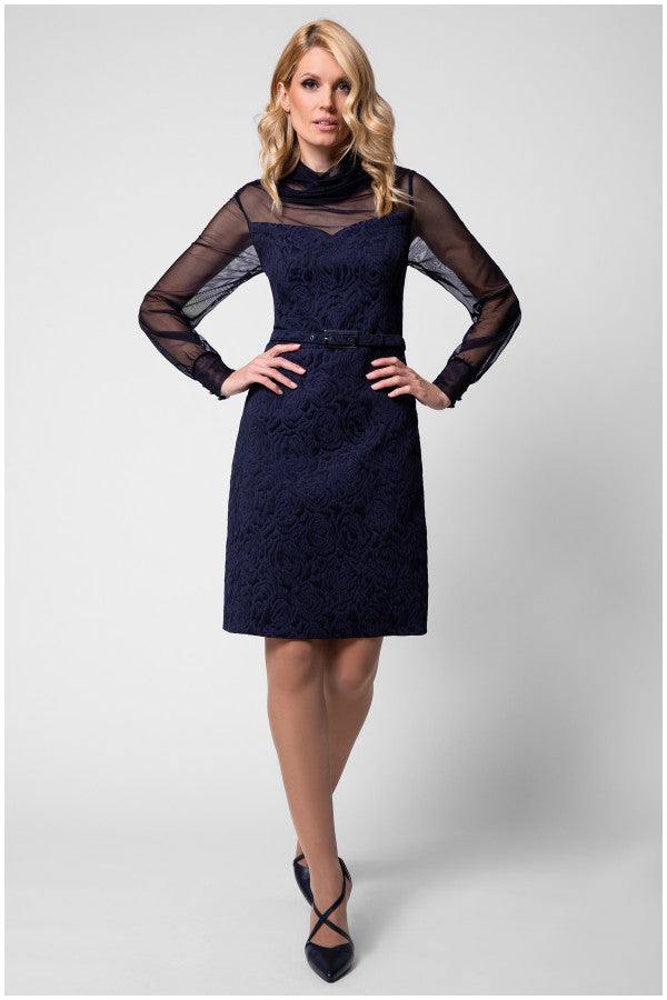 Model front view in navy floral jacquard dress with sheer long sleeves