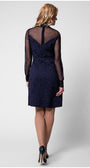 Back view of navy floral jacquard dress with illusion yoke and V detail
