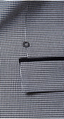 Close-up of Elena tailored blazer houndstooth pattern with black pocket trim and single button closure detailing