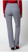 Woman wearing Elena Houndstooth Tailored Trousers in a fitted, elegant silhouette with a classic pattern and high waist design