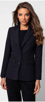 Model in black textured blazer and black trousers front view