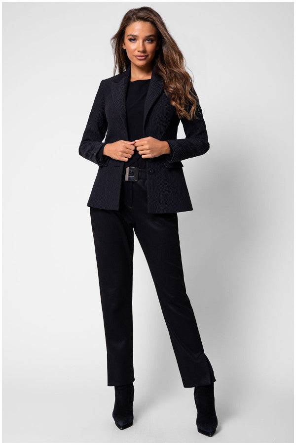 Flat lay of Matea black textured blazer showing buttons and flap pockets