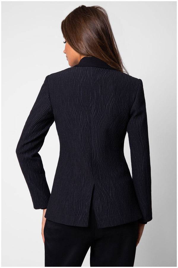 Full length look with black textured blazer styled for office to evening