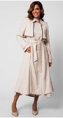 Woman wearing Kim Classic Long Coat in Beige with belt and button details, standing against light background