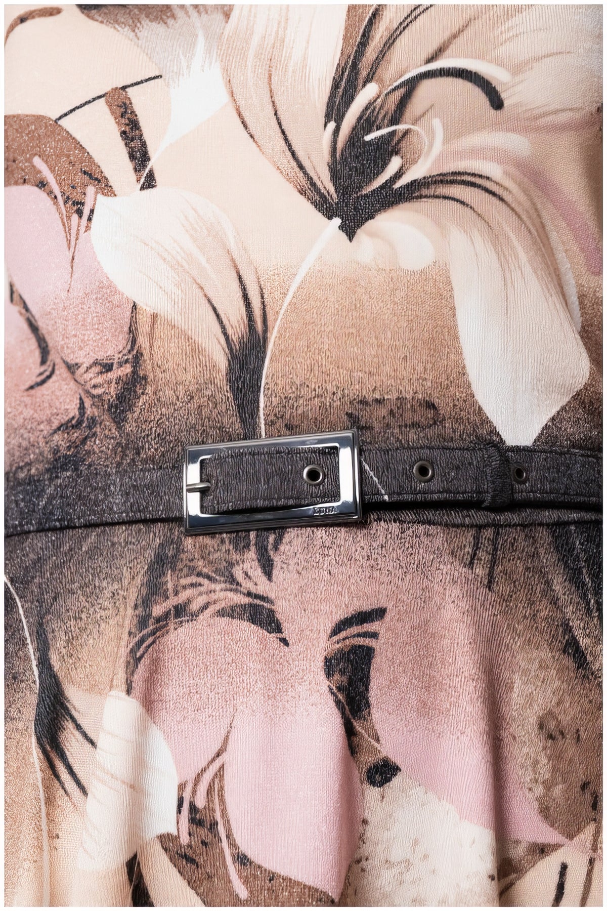 Close-up of the floral pattern and belt detail on the Iris A-line Midi Dress in Blush Floral fabric.