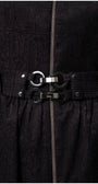 Close-up of zipper and belt detail on the Iris Short Tailored Coat in Deep Black showcasing textured fabric and metal hardware.