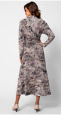 Back view of a woman wearing the Mila Draped Midi Dress in Abstract Taupe with long sleeves and subtle ruching