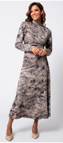Woman wearing the Mila Draped Midi Dress in Abstract Taupe with long sleeves and a high neckline, smiling confidently.