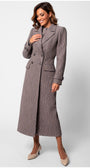 Woman wearing an elegant Isidora Long Textured Coat in Mocha with tailored fit and wave-like fabric pattern
