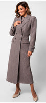 Woman wearing an elegant Isidora Long Textured Coat in Mocha with tailored fit and wave-like fabric pattern