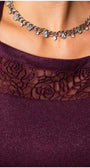 Close-up of lace neckline detail on the Jody Lace A-Line Dress in Bordeaux with subtle metallic fibers visible