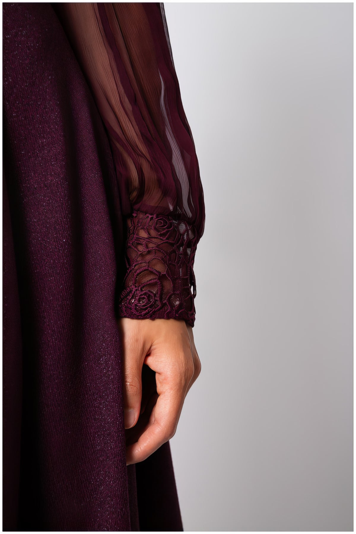 Close-up of lace cuff and sheer sleeve detail on the Jody Lace A-Line Dress in Bordeaux showing texture and fabric quality.