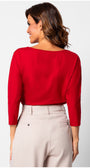 Woman wearing Eva Classic Top in Scarlet Red with three-quarter sleeves shown from back posing against white background