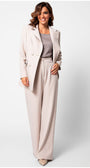 Woman wearing the Eva Classic Top in Taupe Grey paired with a stylish light beige suit and wide-leg trousers