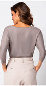 Woman wearing Eva Classic Top in Taupe Grey with soft viscose fabric and subtle stretch, viewed from the back.