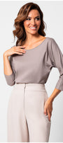 Woman wearing Eva Classic Top in Taupe Grey with three-quarter sleeves and soft, smooth fabric against white background