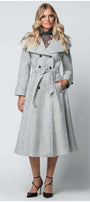 Woman wearing Nicole Wool Wrap Coat in Herringbone Gray with belted waist and double-breasted front details.