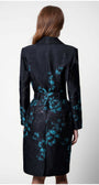 Back view of Emma Light Coat with Teal Floral Jacquard featuring black fabric with teal floral jacquard patterns and belt detail