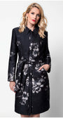 Woman wearing Emma Light Coat with Silver Floral Jacquard featuring sculpted tailoring and subtle metallic sheen on black base